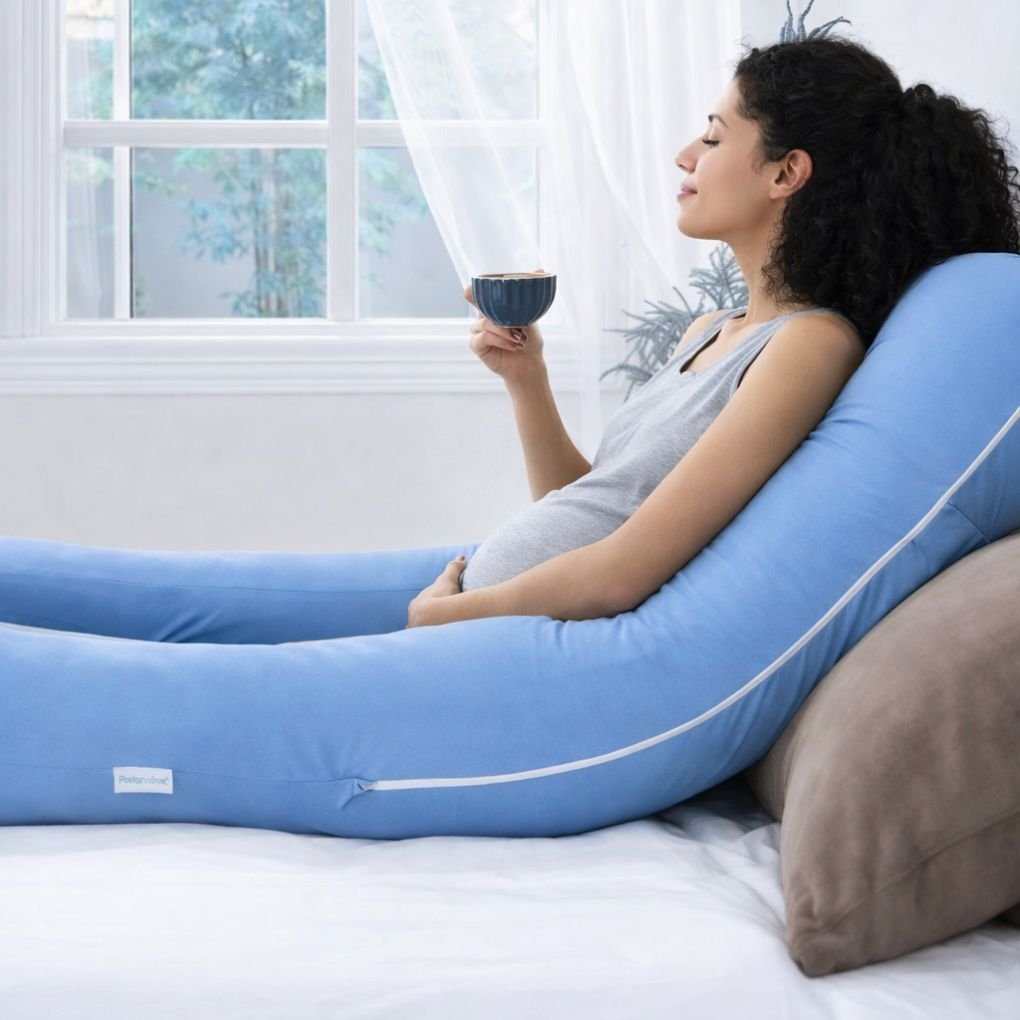 Blue U-shaped maternity pillow offering side-sleeping support for pregnant women