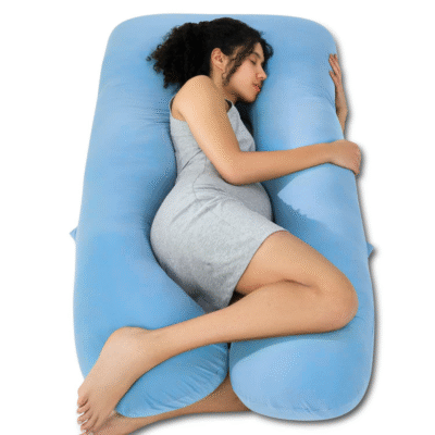 U shaped pregnancy pillow in light blue providing full body support for pregnant women
