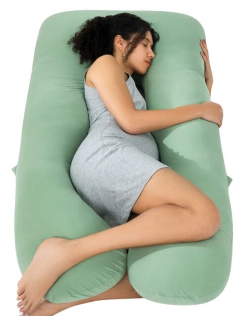 Green pregnancy pillow for comfortable maternity sleep support – ergonomic full-body cushion for expecting moms.